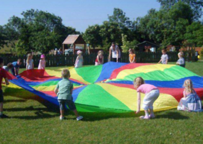 Kids Playing Colour Blanket Parachute Summer Camps at Mellowes Adventure Centre Athboy