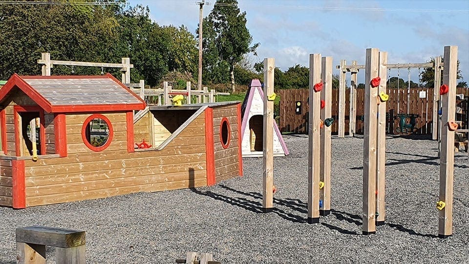 Wooden boat climbing frame playground Mellowes Adventure Centre and Childcare serving Meath and Westmeath