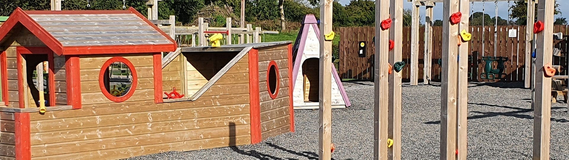 Banner Wooden boat climbing frame playground Mellowes Adventure Centre and Childcare serving Meath and Westmeath